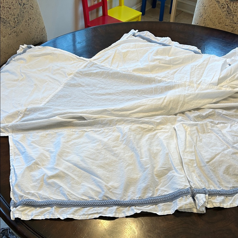 White Crib Skirt from Pottery Barn with Blue Gray Trim